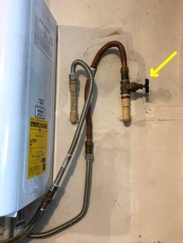 Water heater water line shutoffs located to the right of the water heater Furnace gas