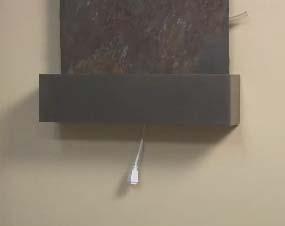 (2) If you do not have an electrical outlet behind the stone we recommend placing the power cord behind the Water tray. Leave approximately 6 inches of exposed cord.
