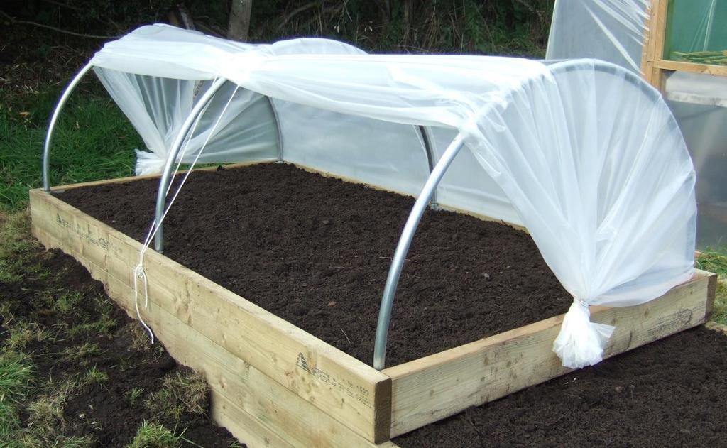 For ventilation you can raise the polythene at one or both sides.