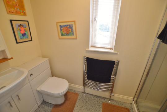 Fitted with three piece suite comprising pedestal wash