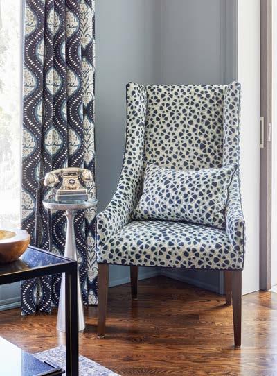 Beautiful blues and warm wood hues create a cosy, casual family room.