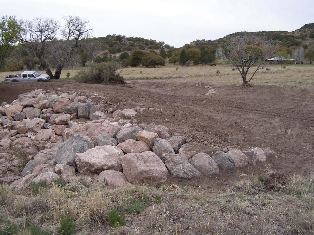 Bedrock reconstructed with boulders Flow splitter diverts