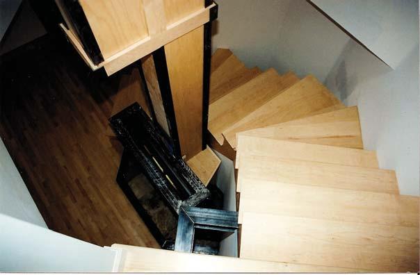 cubed stair treads cantilever over a blackened