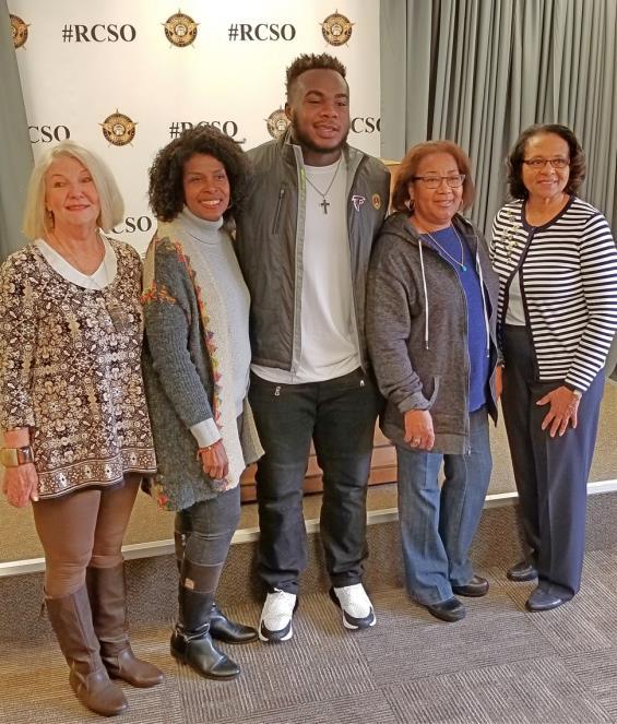 Conyers Garden Club Members Meet Falcon Player Grady Jarrett -- While delivering cookies to the Rockdale County Sheriff s Office to salute their hometown heroes, members of the Conyers Garden Club