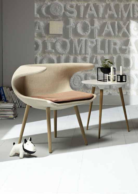 The legs are natural oak, soap treated, lacquered or dark stained. This combination gives the chair at one time a classic look and a futuristic look.