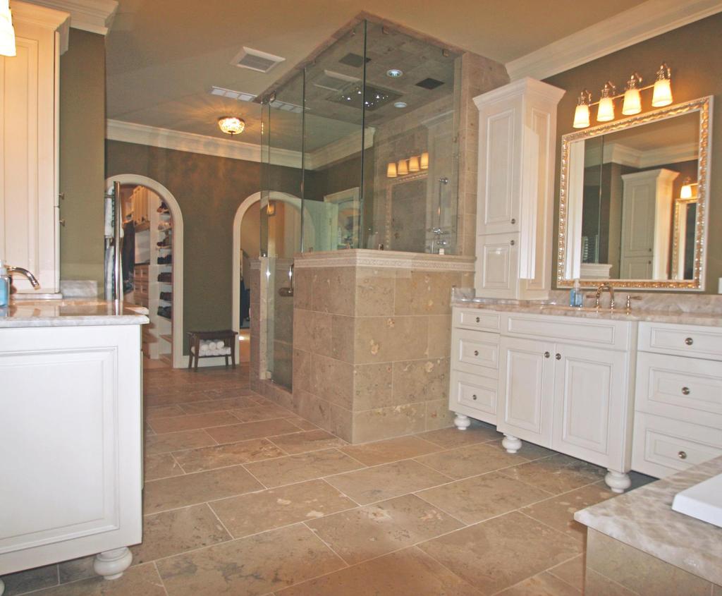 This remodeled bathroom s design improves the looks, function and storage. Added luxury features create a spa-like environment for relaxing in the Master Bathroom.