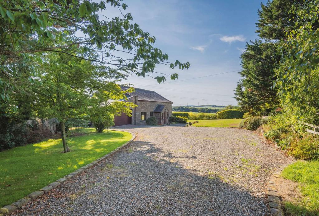WELCOME TO Awaiting you through a handsome gated entrance is the broad gravel driveway leading to Thornfield Barn.