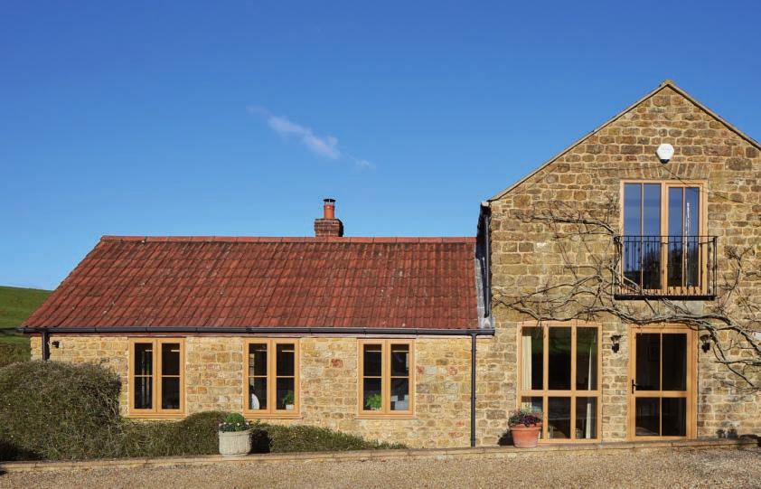 Show your TRUE COLOURS Countryside dwelling fitted with sculptured profile French casement windows