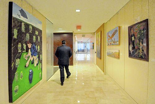 Bob Donaldson/Post Gazette The hallways in the Cohen & Grigsby law firm in EQT Plaza are decorated with works from the Associated Artists of Pittsburgh. The works in the exhibit rotate over time.