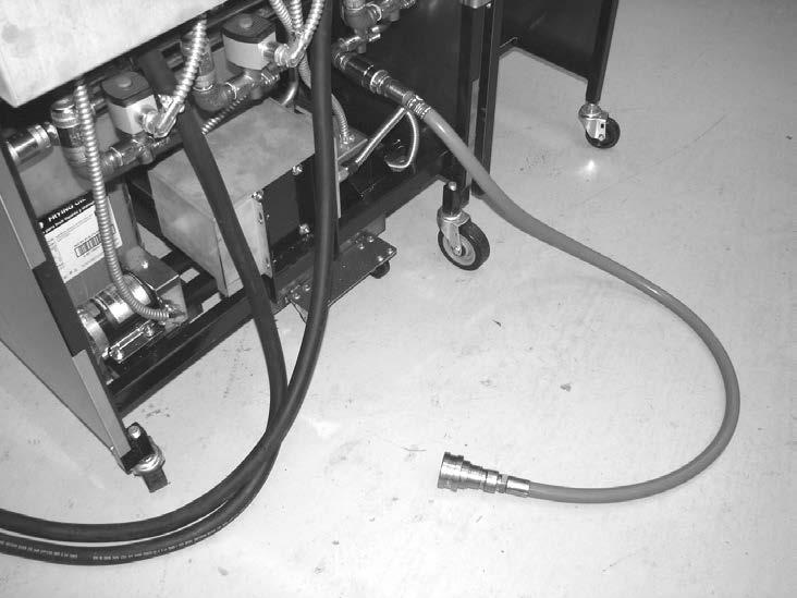 3-15. DISCARDING OIL FROM VAT USING OPTIONAL BULK OIL DISPOSE SYSTEM 1. Connect female quick disconnect attached to the hose at the rear of fryer, to the correct male quick disconnect at the wall.