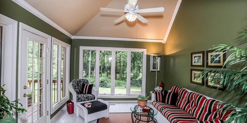 Sunroom Kick back and relax in the delightful sunroom illuminated with tons of natural light through the