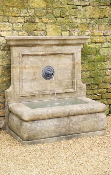 The Onslow Park Wall Fountain with Lead Spout [item 13] A hand carved natural limestone wall fountain, having a lead spout centred to the classical back plate.
