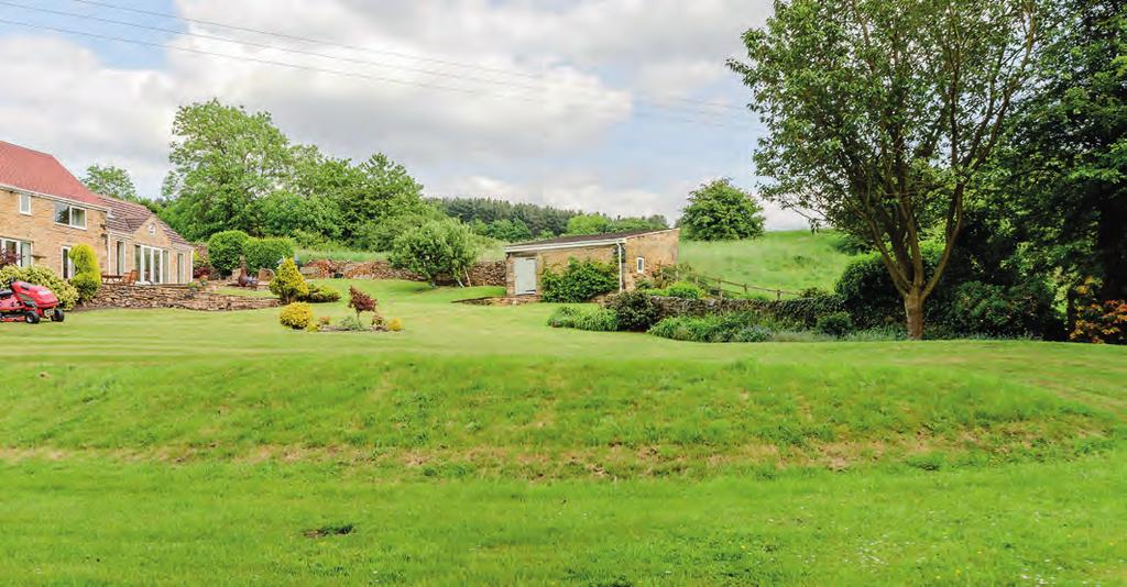The property presents spacious accommodation including a versatile garden room which opens to views over the