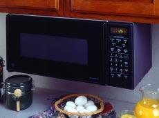 cost) Trim kit provides a built-in appearance for your microwave. Easy under cabinet installation leaves counter space free for food preparation. Popcorn Pad maximizes popping without scorching.