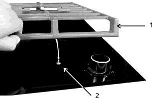 The location of grating 1. Cast iron cooking grating. 2. Centering setting pin of the grating.