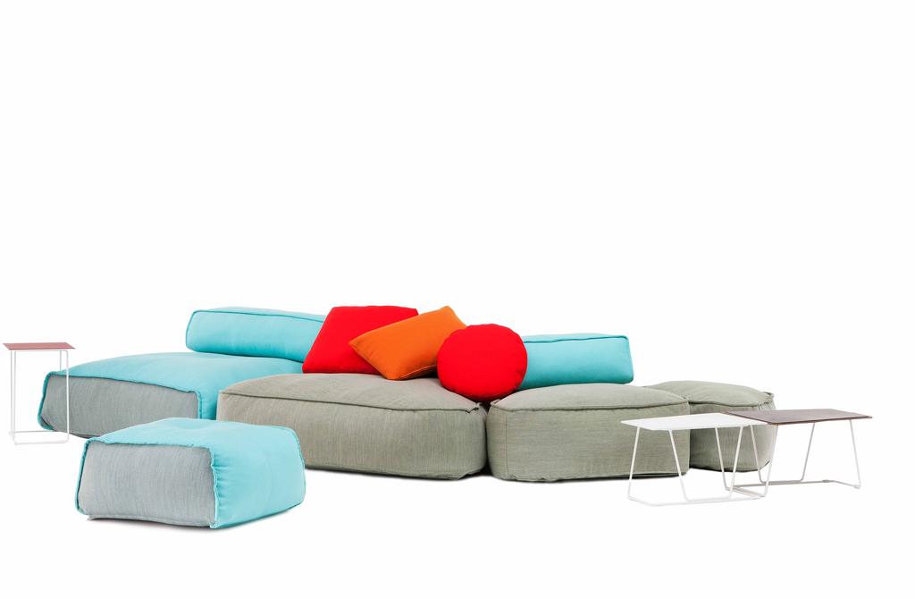 Schiavello Kush 3 4 A playful collection of tailored, oversized ottomans with moveable backrest bolsters, Kush is inspired by pebbles which evokes