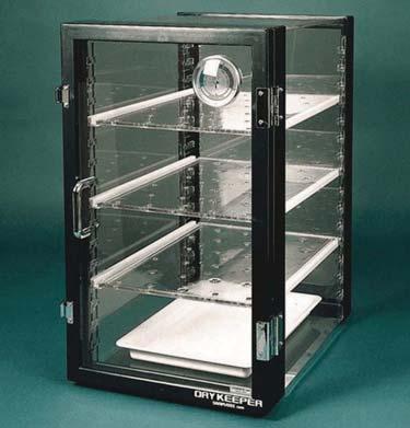 Vertical model 075 has three clear vented shelves that adjust to 5 levels, door two clear adjustable shelves with vent holes, slide-away door, and desiccant tray.