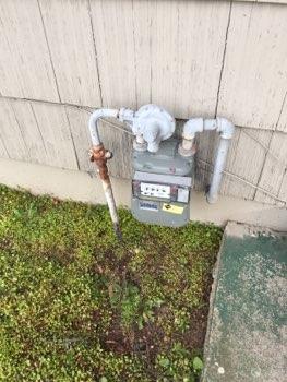 9. Gas Condition Meter located at South side. Main Gas shutoff is located to the lower left of the meter. 10.