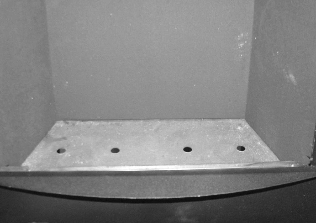 1 Remove the glass panel and retaining trims as detailed on page 11 & 12. Place the ribbed ceramic fuelbed base on top of the fuelbed support and pull fully forwards to the burner.