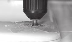 DRILLING A HOLE IN A PORCELAIN/CERAMIC SINK: CAUTION This type of sink can chip very easily.