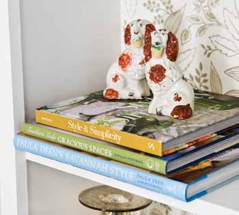 Experiment with temporary wallpaper, and adhere it to the back of your bookshelves for a fun accent. You can even change it out seasonally!