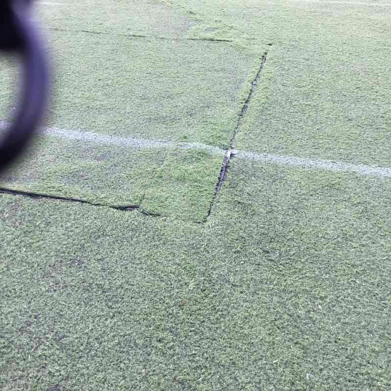 ATHLETIC FIELDS PLAYING SURFACE Photo1 Open seams at the Baseball base covers. violations recorded.