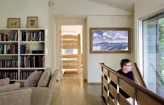 The painting of the ocean off Cape Elizabeth is by the home s architect, Sam Van Dam.