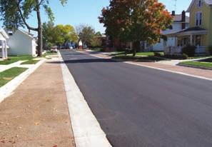 Composed entirely of asphalt, it accommodated on-street curbside parking along its length.