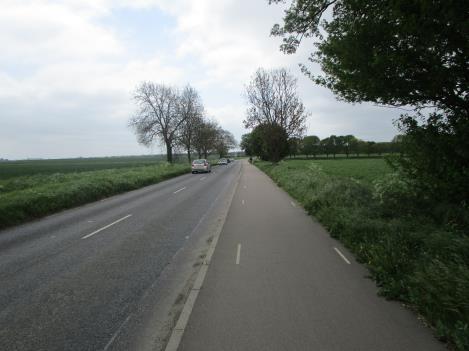 The existing path is generally of the width and surfacing expected for a Greenway although it has no verge separating it from the carriageway which is a disadvantage and the route is not continuous