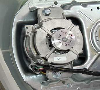Drive motor 5. Support the motor when removing the second bolt.