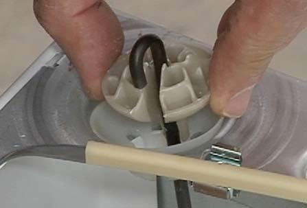 Outer tub 6. Lift each suspension rod and rotate the ball at the top to allow the rod to align with the slot and slide out of the ball. Electrical Shock Hazard Disconnect power before servicing.