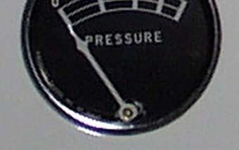 The pressure indicator located in RH bulkhead in baggage