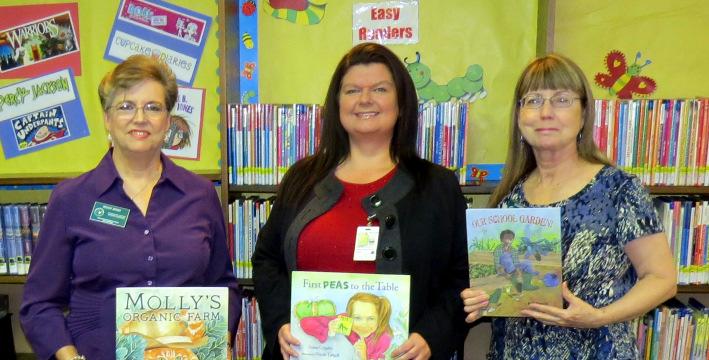 At the Schertz Library the books were accepted by the Children's Librarian, April Toman. At the Marion Library the books were accepted by Librarian, Susan Hale (on the far right) and her assistants.