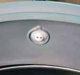 Ensure that the washer is placed on the outside and that the nozzle is aligned