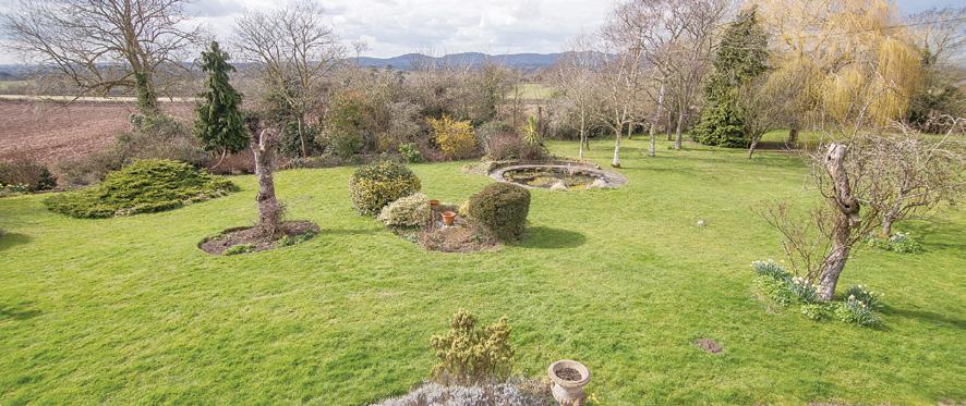 SQUIRREL COTTAGE PIPERS END, LONGDON, TEWKESBURY, GL20 6AP A HIGHLY DESIRABLE GRADE II LISTED PERIOD DETACHED COTTAGE AFFORDING STUNNING FAR REACHING VIEWS TO THE MALVERN HILLS AND SET WITHIN GROUNDS