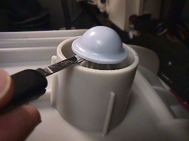 You can unscrew the retainer inside the baffle to replace the roller balls.