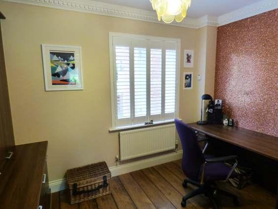 Study with full height fitted cupboards and desk area, radiator, double glazed windows, oak flooring and cornice to ceiling. Cloakroom having a low flush w.c., vanity unit with wide wash hand basin, heated towel rail and tiled floor.