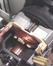 Exposure to spinning components: brushroll, motor, belt, fan and exhaust debris. ii.