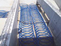 To lay the pipes under the building, rolled pipes are set as they are, to reduce construction time greatly.