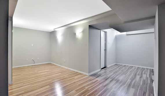 flooring in a neutral shade New baseboards Smooth finished ceiling Ceiling light fixture Also