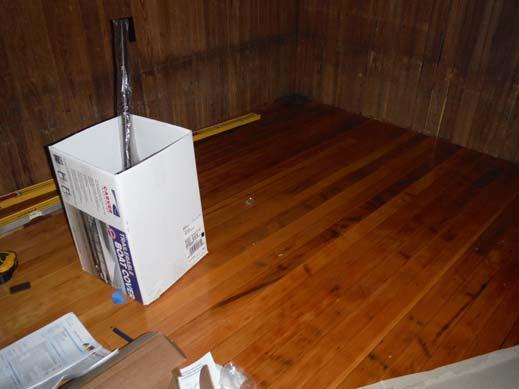 Historic wood flooring has been installed toward