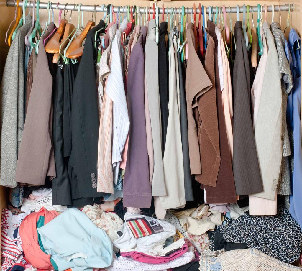 The code relating to lighting clothing closets requires that the light should be placed on a ceiling or front wall above the door of the closet, within a safe distance from shelves and moveable items.