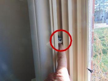 7. Ceiling Condition Damaged hardware was noted on the front, middle bedroom window.