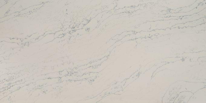 BIANCO DOLOMITE A white ground conjures brisk air while gray and charcoal diagonal veins create the