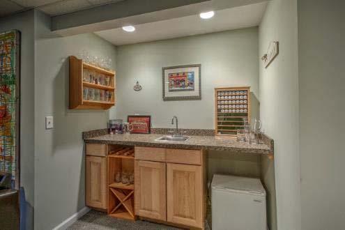 There is also a Butler s Pantry at the far end, a smaller alcove area, and storage/utility room.