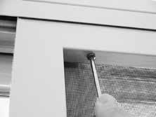 Tighten the roller adjustment screws as necessary, using a Phillips-head screwdriver. WARNING: Screen will not stop child or pet from falling out of door. Keep child or pet away from open door.