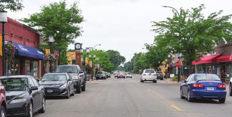 Develop a visual promenade of commercial uses along 41½ Avenue leading to downtown, along the edge of the Hubbard Marketplace, creating a town square with wide sidewalks. C.