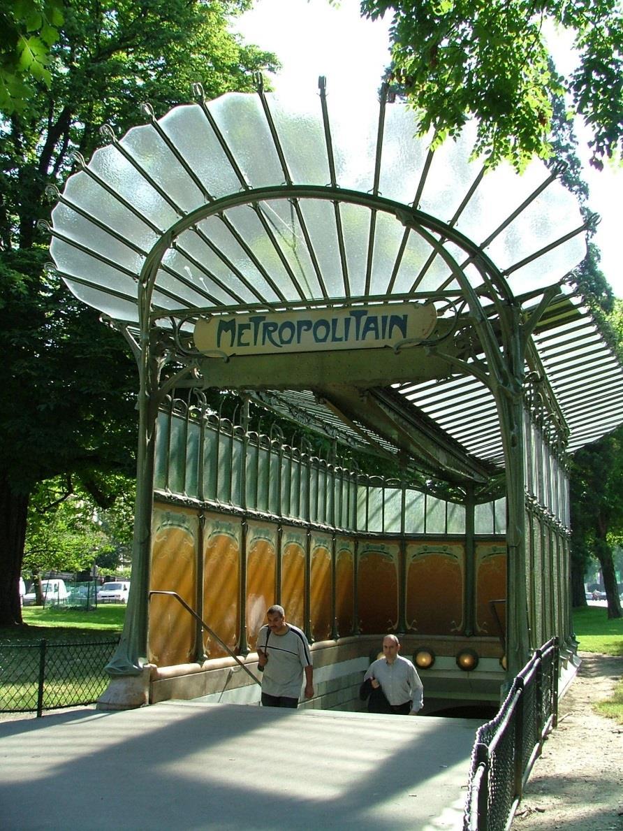 Guimard dealt with this project by designing a number of standardized elements metal railing panels, signs, light standards, and wall panels that could be prefabricated in quantity and assembled in