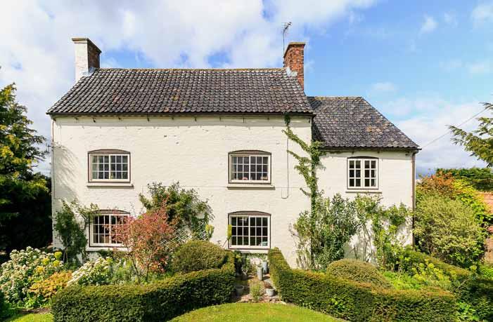Charlton Farm Staunton in the Vale, Nottinghamshire A glorious Grade II Listed period renovated family farmhouse with a lovely high quality separate two bed single storey barn conversion, indoor