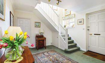 The ground floor entrance hallway is welcoming and of a good size, with doors to the formal reception room, study, cloakroom and kitchen.